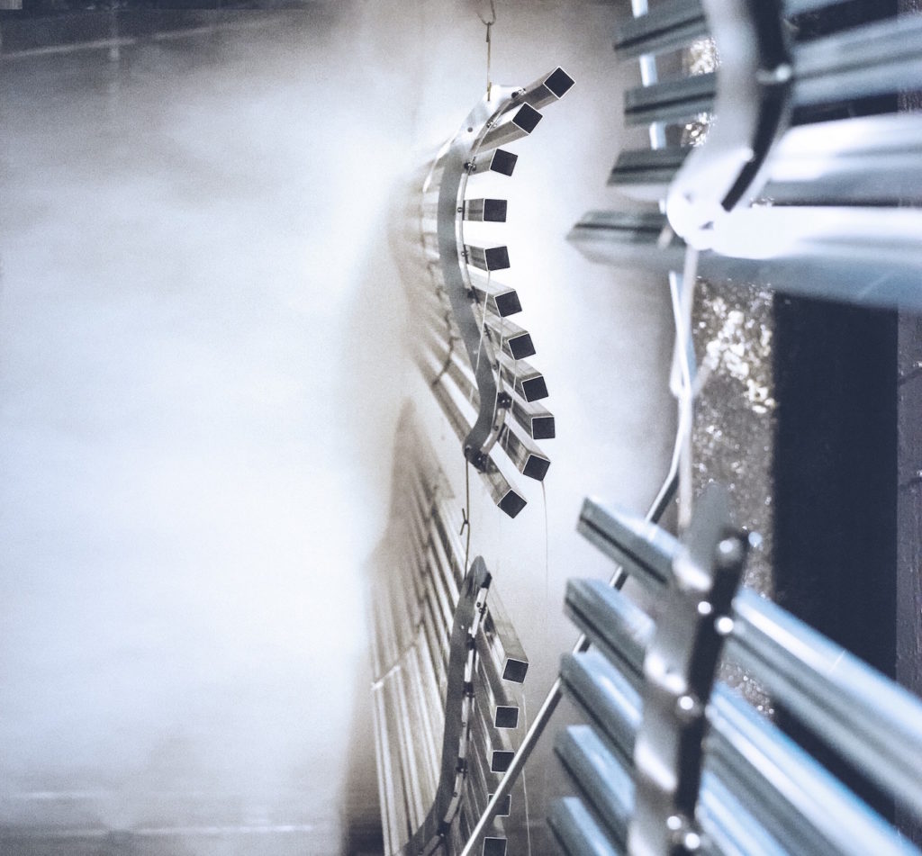 Thin film conversion coatings are designed to enhance multi-metal parts