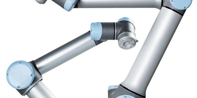 Collaborative robots load and unload machine tools