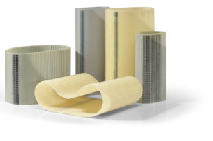 Maintenance-free polyurethane timing belt for improved dimensional stability
