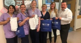 Tomlinson Hall donates 100 baby grows