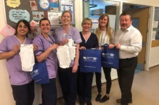 Tomlinson Hall donates 100 baby grows