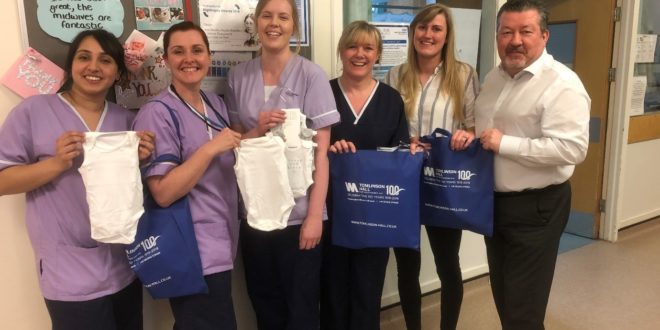 Tomlinson Hall donates 100 baby grows