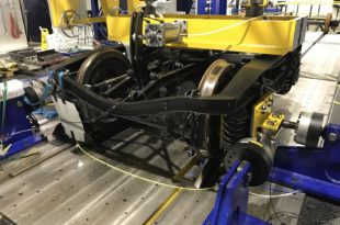 Non-contact colour sensor counts bogie wheel pulses in rail research project