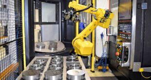 Lathe tending system modified to extend unattended production