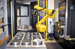 Lathe tending system modified to extend unattended production