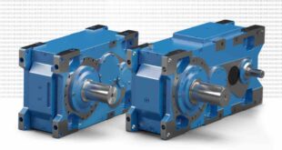 Industrial gear unit with increased centre distance suited to U-shaped configuration of drive, motor and cable drum